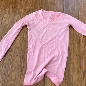 Lululemon STAINED swiftly tech long sleeve size 2 pink look at description